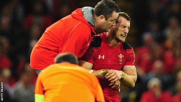 Sam Warburton receives treatment