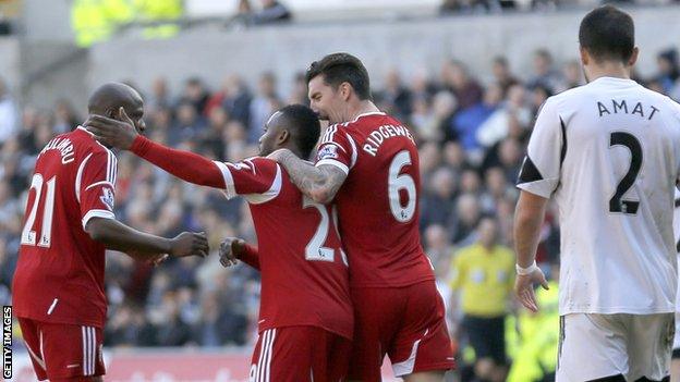 Stephane Sessegnon of West Brom celebrates his equaliser with Youssouf Mulumbu and Liam Ridgewell against Swansea