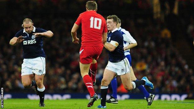 Stuart Hogg late tackles Dan Biggar at the Millenniums Stadium