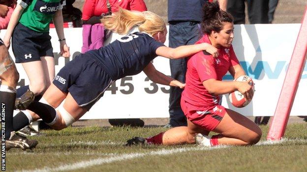 Shona Powell-Hughes scores a try for Wales against Scotland