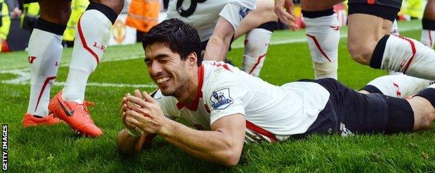 Luis Suarez celebrates after the full-time whistle