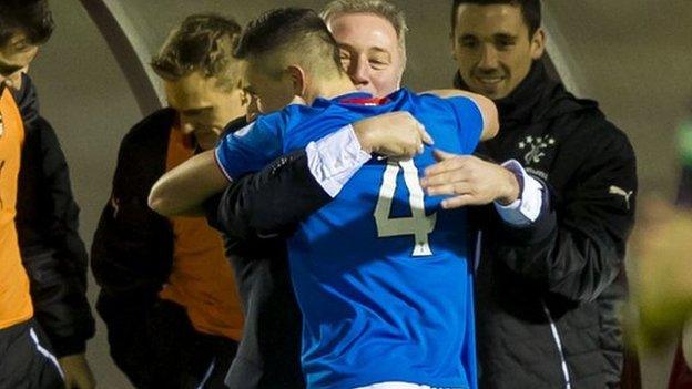 Ally McCoist embraces Fraser Aird after the 19-year-old put Rangers 1-0 up against Albion Rovers