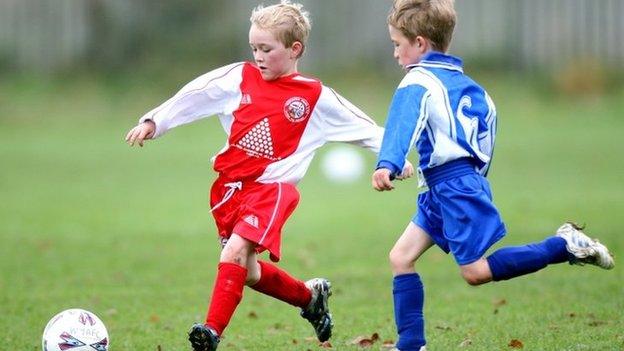 Children playing football