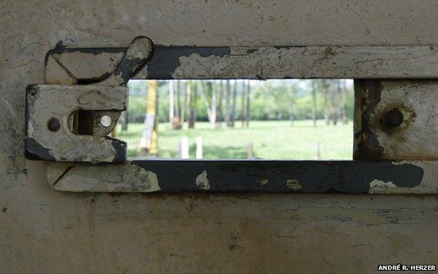 The view through a small hatch in a prison door