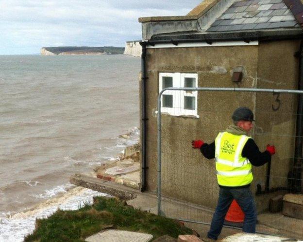 Demolition of a cottage at Birling Gap