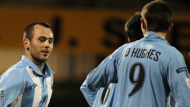 Stephen Hughes celebrates after scoring the first goal for Warrenpoint Town against Glenavon