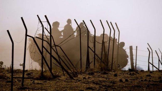 An Israeli army vehicle seen during a military exercise near the border with Syria on in June 2013 in the Israeli-occupied Golan Heights