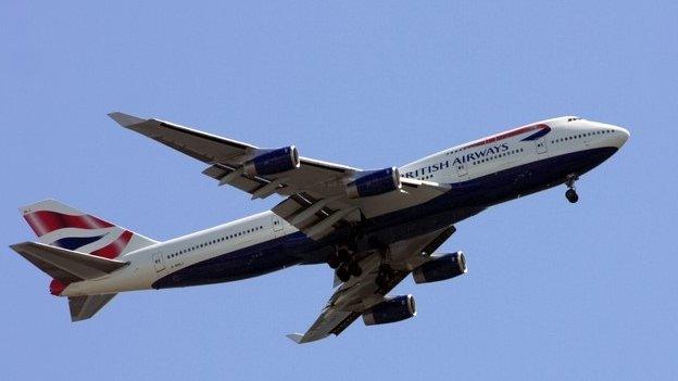 A British Airways 747-436 deploys its landing gear on its approach to Heathrow Airport 14/07/2009