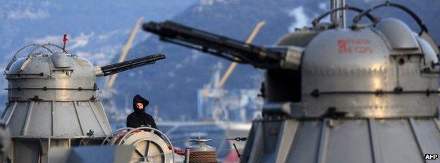 Russian seaman on board the Turbinist navy minesweeper patrolling the harbour of Sevastopol (10 March 2014)