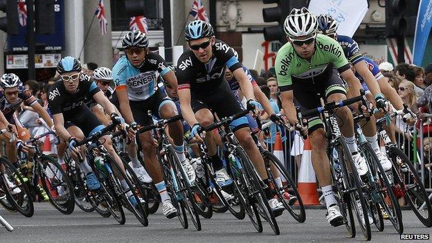 Cyclists taking part in a 100-mile race from Surrey to London