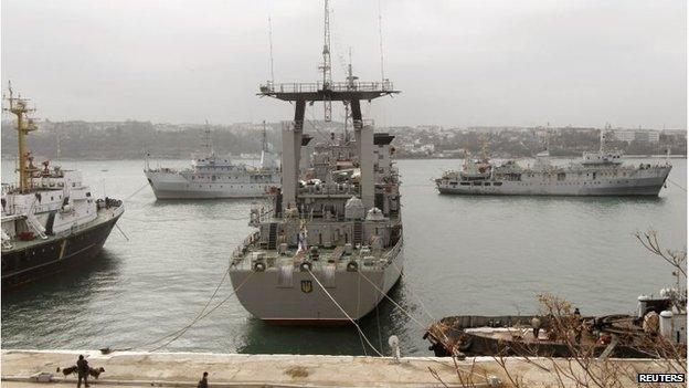 Ukrainian ship Slavutich (C) is seen blocked by two Russian ships at the harbour in Sevastopol, Crimea (20 Mar 2014)