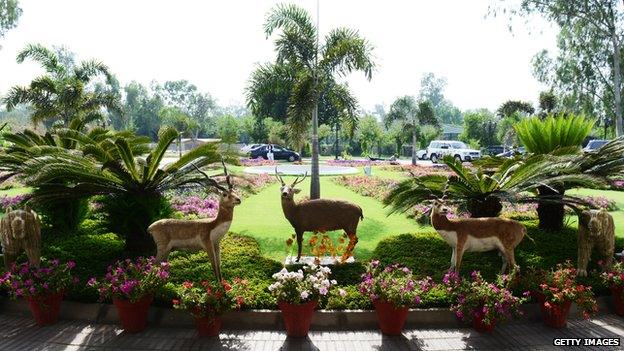 Stuffed game animals line the driveway of Pakistani Prfime Minister Mian Nawaz Sharif's residence