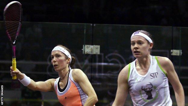 Madeline Perry (left) battles with England's Sarah-Jane Perry in their second-round match at the World Championships