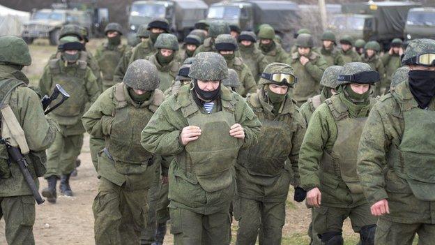 Russian troops occupy a Ukrainian base near Simferopol on 5 March, 2014.