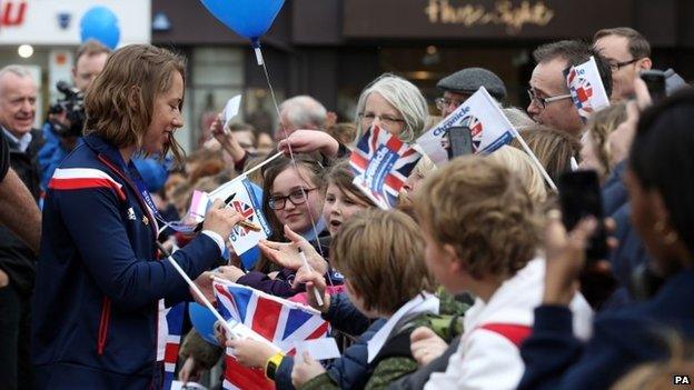 Lizzie Yarnold with schoolchildren