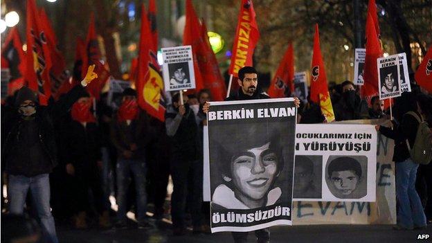 Anti-government protesters in Ankara carry posters bearing the image of Berkin Elvan, 15, who died from injuries sustained in last year's protests (14 March)