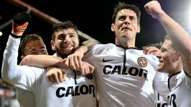 Nadir Ciftci (left) celebrates with his Dundee united team-mates after his goal against Hearts