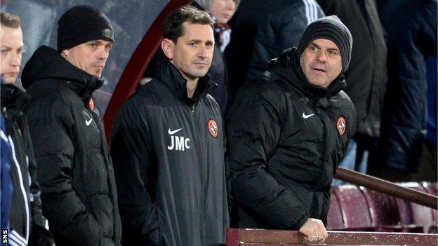 Jackie McNamara (centre) watches Dundee United beat Hearts 2-1