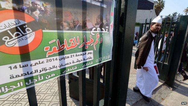 An Algerian man leaves after attending a gathering organised by political parties calling for the boycott of the 17 April presidential elections