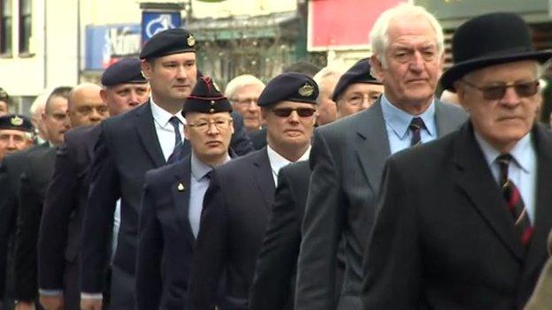 Veterans from the former Royal Gloucestershire, Berkshire and Wiltshire Regiment march through Gloucester