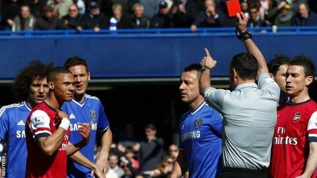 Kieran Gibbs is wrongly sent off against Chelsea