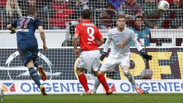 Bastian Schweinsteiger heads home