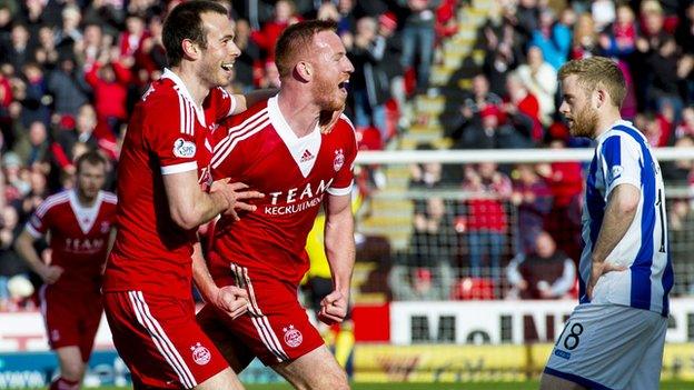 Andy Considine and Adam Rooney celebrate Rooney's equaliser against Kilmarnock