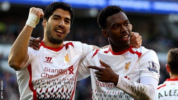 Luis Suarez and Daniel Sturridge celebrate at Cardiff