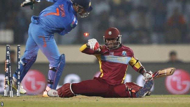 Marlon Samuels is stumped by India captain Mahendra Dhoni