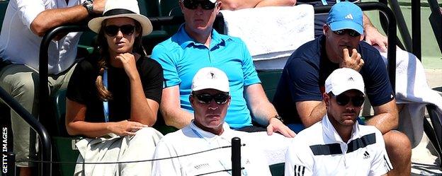 Ivan Lendl (centre) watches along with Kim Sears (left)