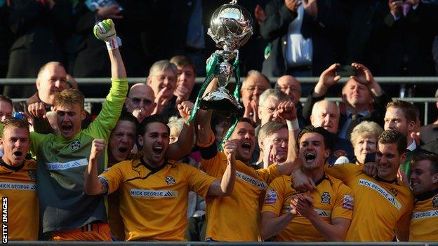 Cambridge United celebrate with the FA Trophy