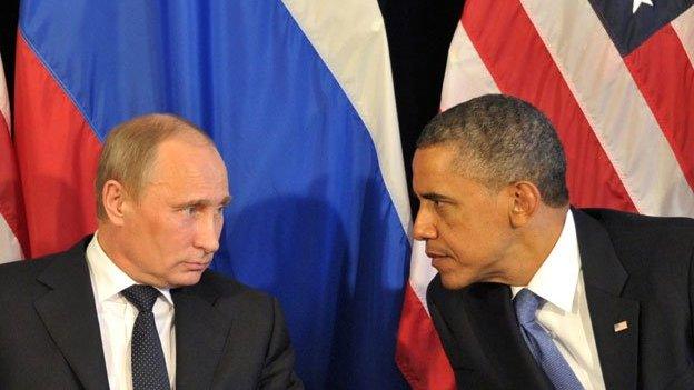 US President Barack Obama (R) meets his Russian counterpart Vladimir Putin (L) in Los Cabos, Mexico, on June 18, 2012