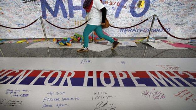 Banner with messages for missing passengers