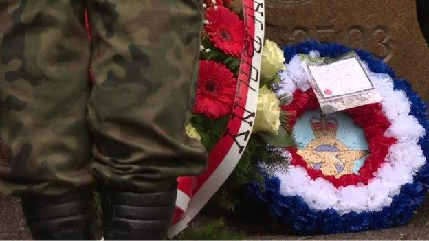 Wreaths laid at the entrance to the tunnel