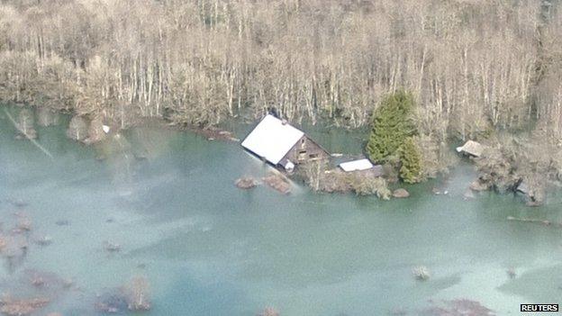 An aerial view of the area affected by a landslide near State Route 530 near Oso, Washington, on 23 March 2014