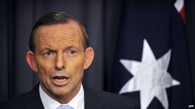 Australia's Prime Minister Tony Abbott speaks to the media at Parliament House in the capital Canberra on March 25, 2014