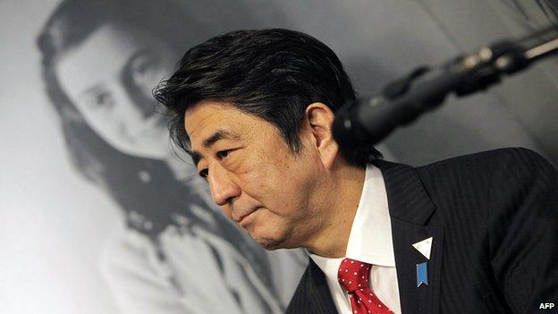 Japanese Prime Minister Shinzo Abe visits the Anne Frank museum in Amsterdam on March 23, 2014.