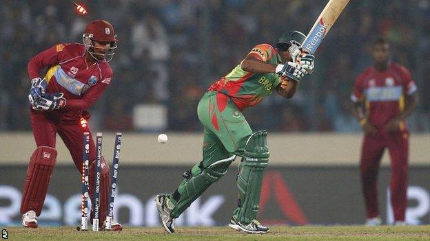 Bangladesh batsman Shakib Al Hasan is bowled by Krishmar Santokie