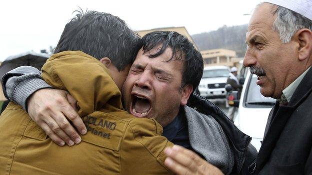 Sardar's brother, Bashir Ahmad cries during the funeral ceremony in Kabul