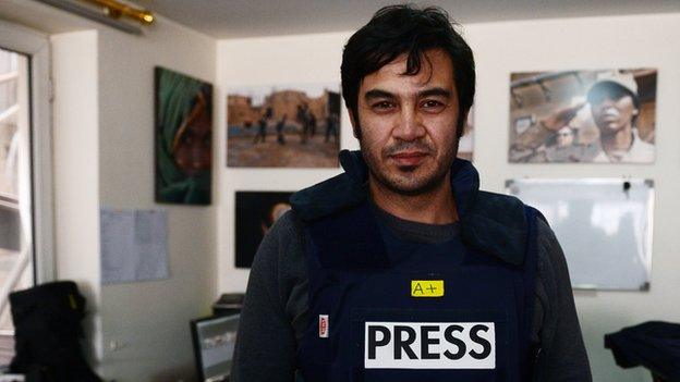 Sardar Ahmad in the AFP office in Kabul hours before he, his wife and two of his children were killed in the Serena hotel attack