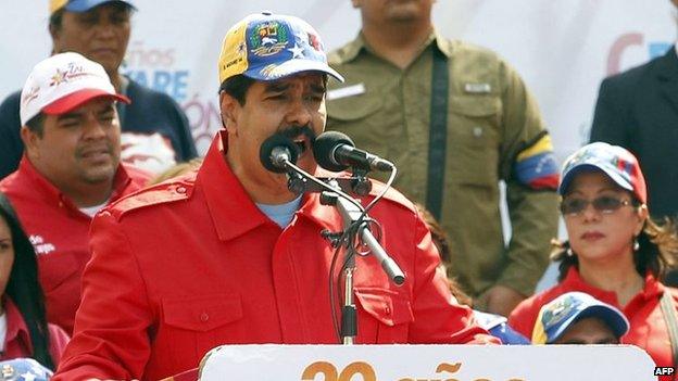 Venezuelan President Nicolas Maduro delivers a speech during a march in Caracas on 26 March, 2014