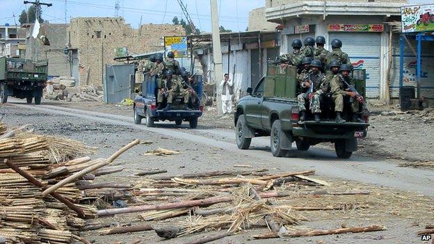 Troops of Pakistan army patrol in troubled area after a fierce fight between Pakistani forces and militants in Miran Shah in Pakistan's tribal area of North Waziristan