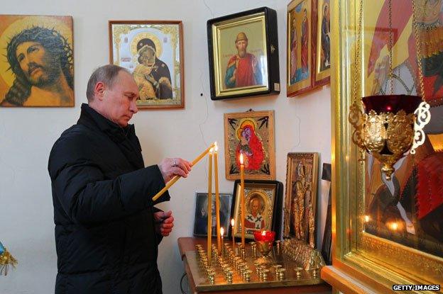 Putin in church 2013