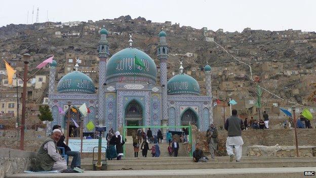 Western Kabul's blue-tiled Sakhi shrine, surrounded by steep hillsides