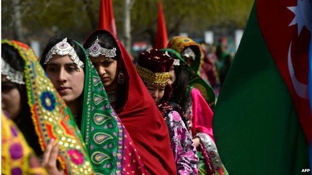 Traditionally clad Afghan women attend the official Nawroz festivities at the Presidential Palace