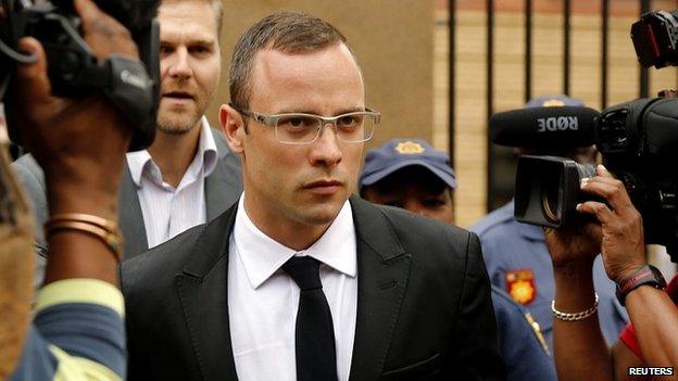 Oscar Pistorius leaves the courtroom in Pretoria - 28 March 2014