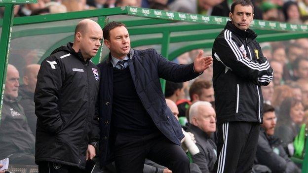 Ross County manager Derek Adams (centre)