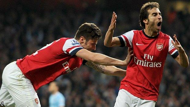 Olivier Giroud and Mathieu Flamini