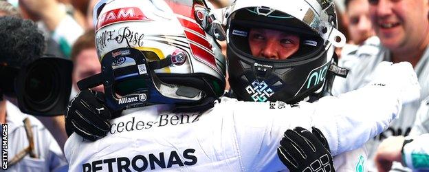 Lewis Hamilton embraces Nico Rosberg