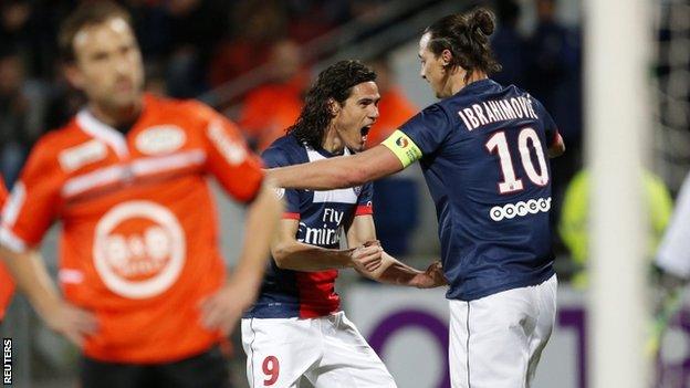 Paris St-Germain's Edinson Cavani celebrates with his team-mate Zlatan Ibrahimovic